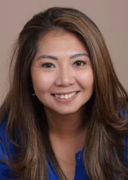 Prima Muzirmar, psychiatric nurse practitioner (PMHNP), smiling in a professional headshot